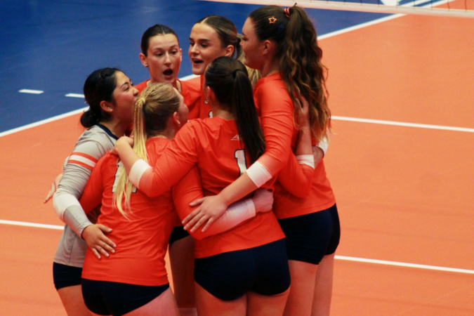 Syracuse Volleyball players huddle during SU's match against Buffalo on Sunday, Sept. 20, 2026, in the Women's Building.
