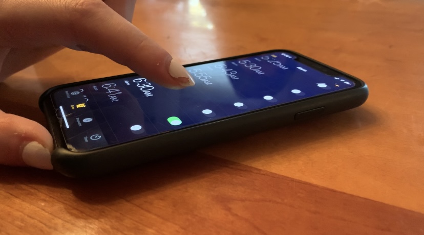 Finger on Phone 7 Ways to Maintain Your Mental Health This Semester During COVID-19