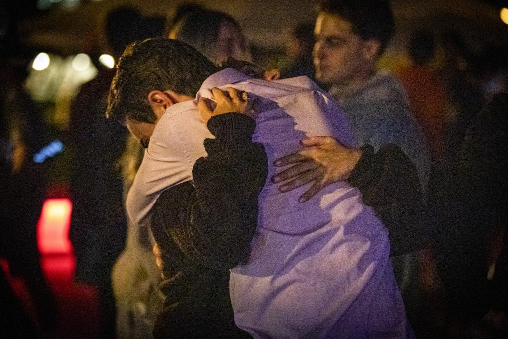 Syracuse University students gathered outside Hendrick's Chapel for a candlelight vigil in honor of Hunter Brooks Watson and Vincent Gian Maugeri, two brothers of the Phi Kappa Psi fraternity who lost their lives to distracted driving.
