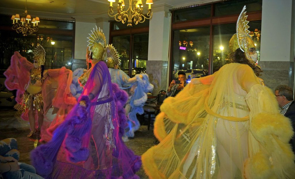 Prior to the Syracuse Fashion Week show, performers took the stage to do a strip-tease Burlesque dance number with references to Pictures of Dorian Gray.