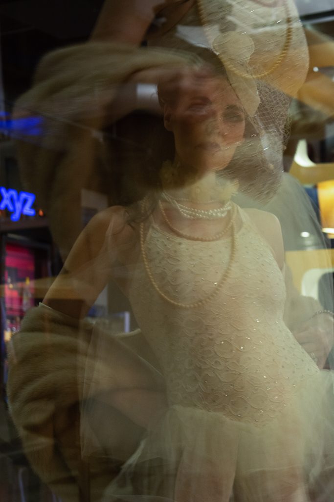 A double exposure in camera shows off one of the designs that paid homage to the past century on Thursday.