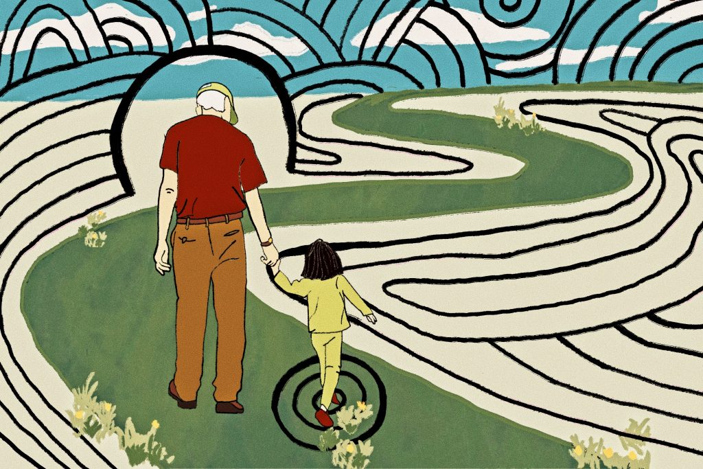 Elderly man and child walking down path