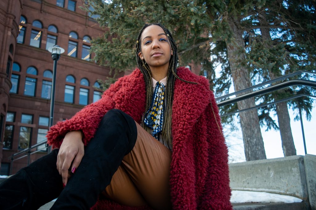 Natalia M. Pérez-Gonzalez shows how she styles her winter wardrobe on the Syracuse University campus.
