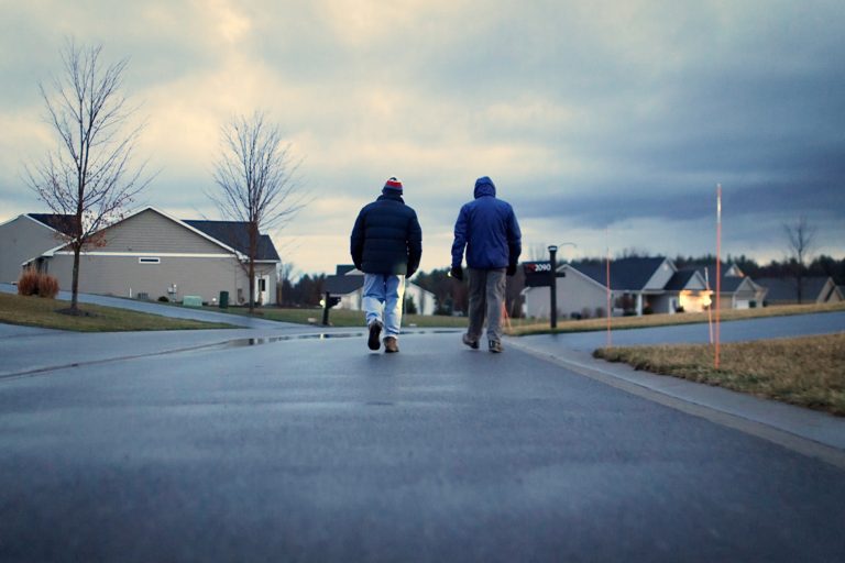 Two people walking outdoors for Never Stand Still documentary