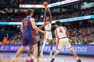 Syracuse forward Donnie Freeman squares up for a three against Clemson in the ACC home opener on Wednesday, Dec. 31, 2025, at the JMA Wireless Dome.
