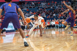 Syracuse guard J.J. Starling weaves through Clemson defenders on his way to the hoop on Wednesday, Dec. 31, 2025, at the JMA Wireless Dome.