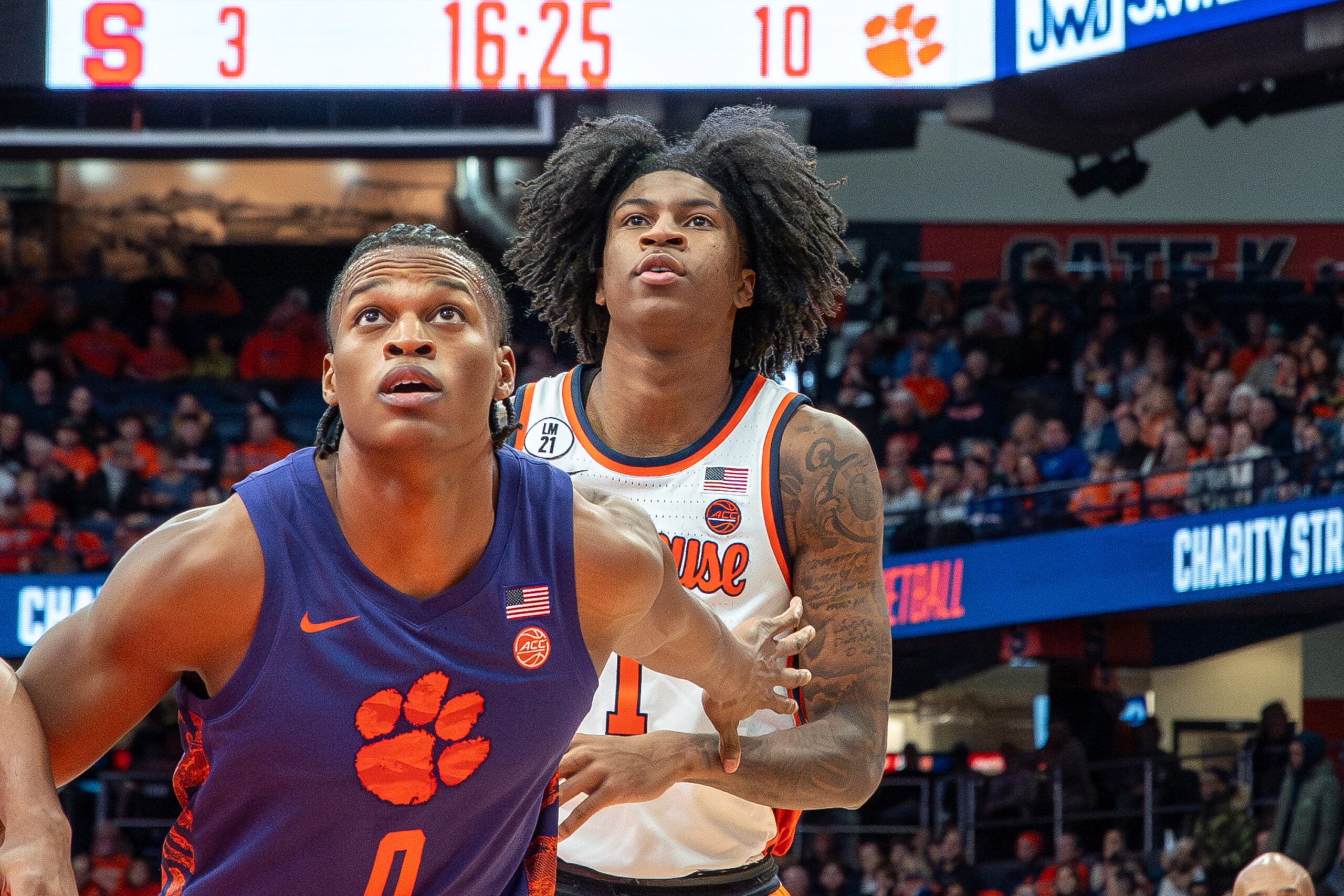 Clemson forward RJ Godfrey boxes out Syracuse forward Donnie Freeman on Wednesday, Dec. 31, 2025, at the JMA Wireless Dome.