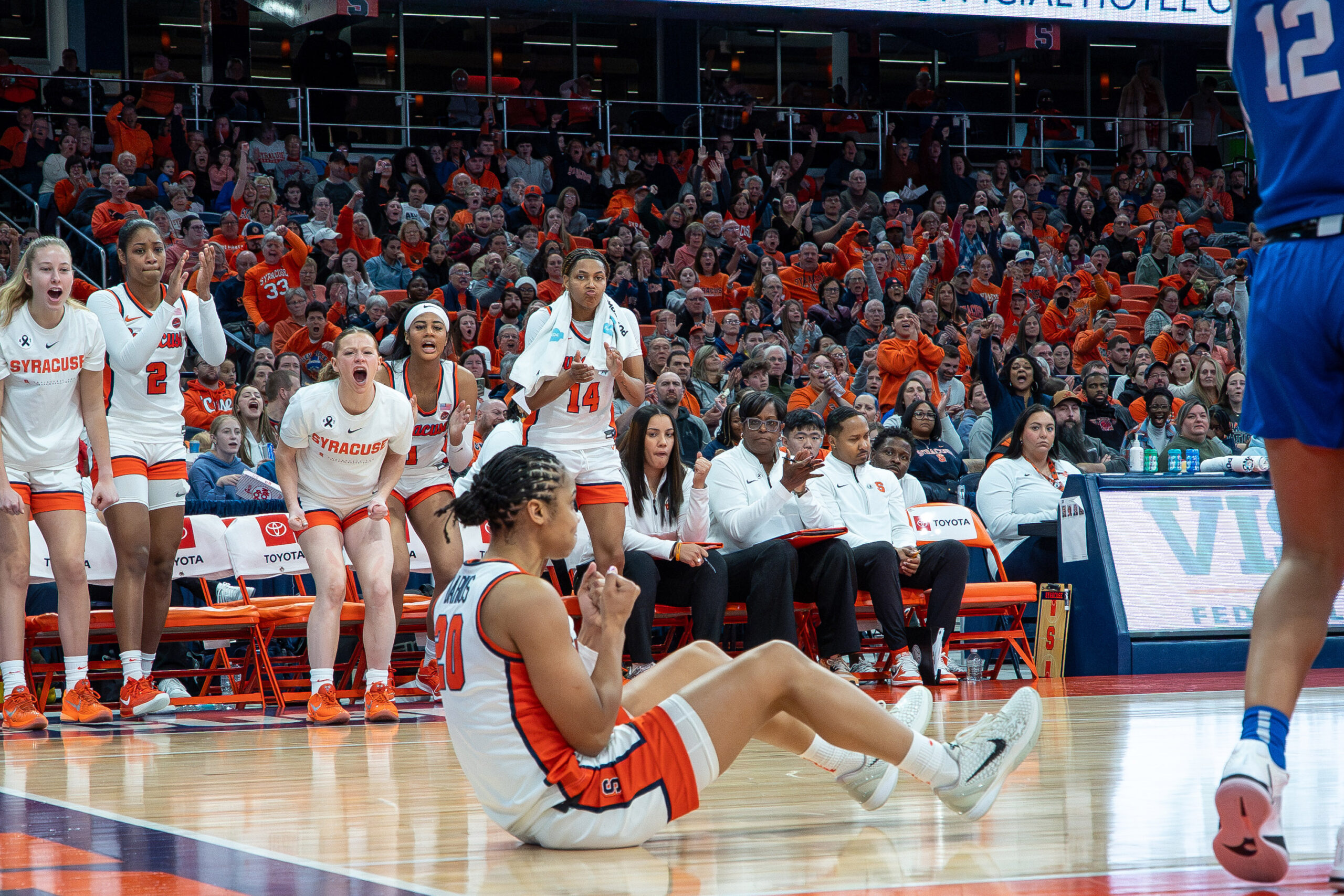 The Syracuse bench gets fired up after guard Dominique Darius converts an and-one against Duke on Sunday, Dec. 28, 2025, at the JMA Wireless Dome.
