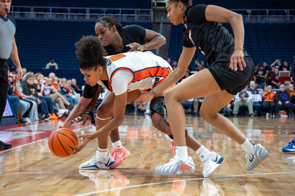 Syracuse forward Aurora Almon battles to keep possession against Virginia Tech at the JMA Wireless Dome on Thursday, Jan. 8, 2026.
