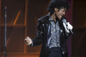In "Michael" Jaafar Jackson performs onstage as Michael Jackson dawning a sparkly jacket and signature white glove.