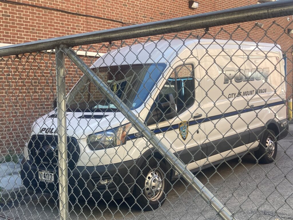The Mount Vernon police prisoner-transport van parked behind headquarter on Oct. 17, 2025. A day earlier, a handcuffed prisoner managed to fire a gun, hitting another prisoner in the leg as they were being brought to the Westchester County jail.