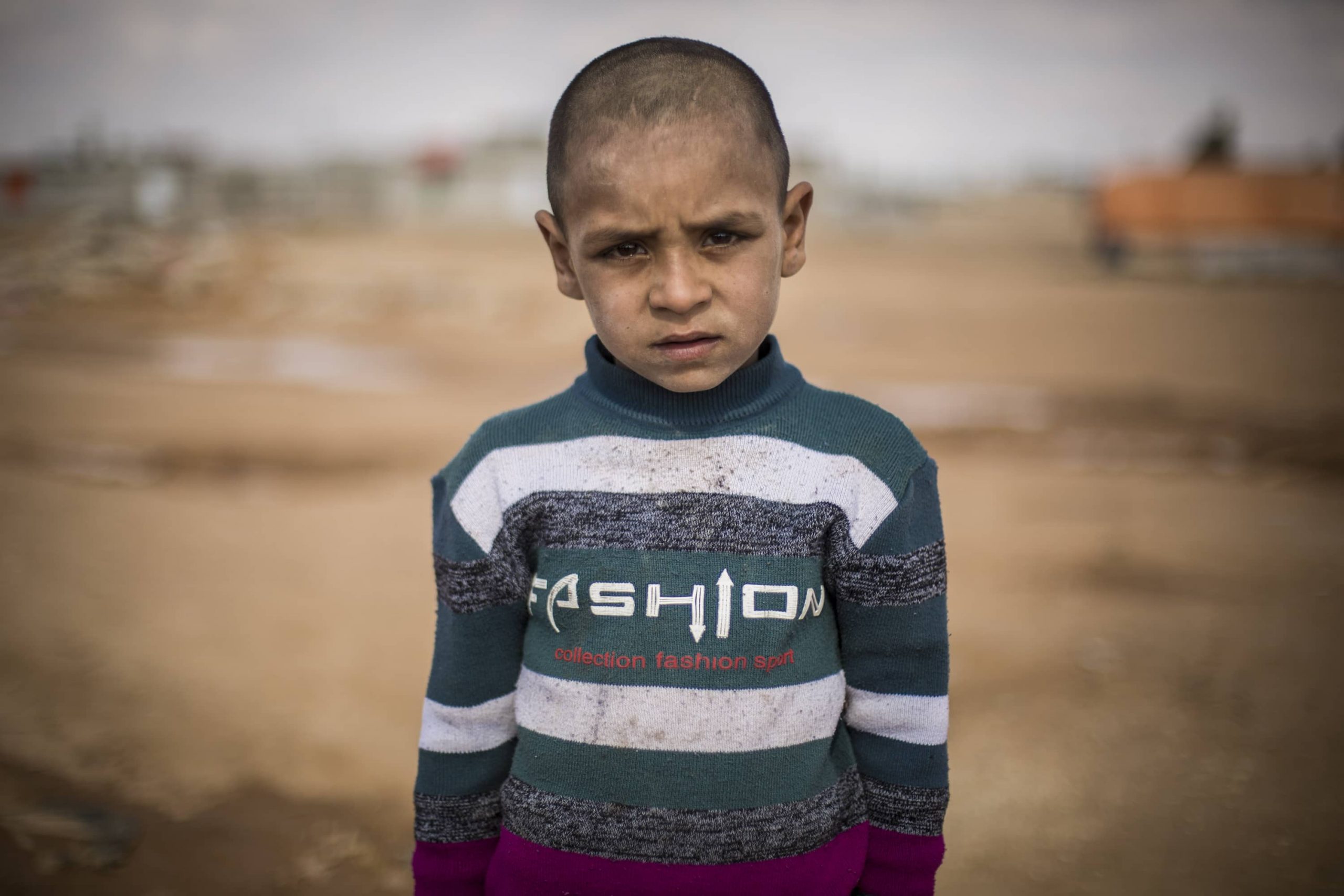 Little boy looking at the camera