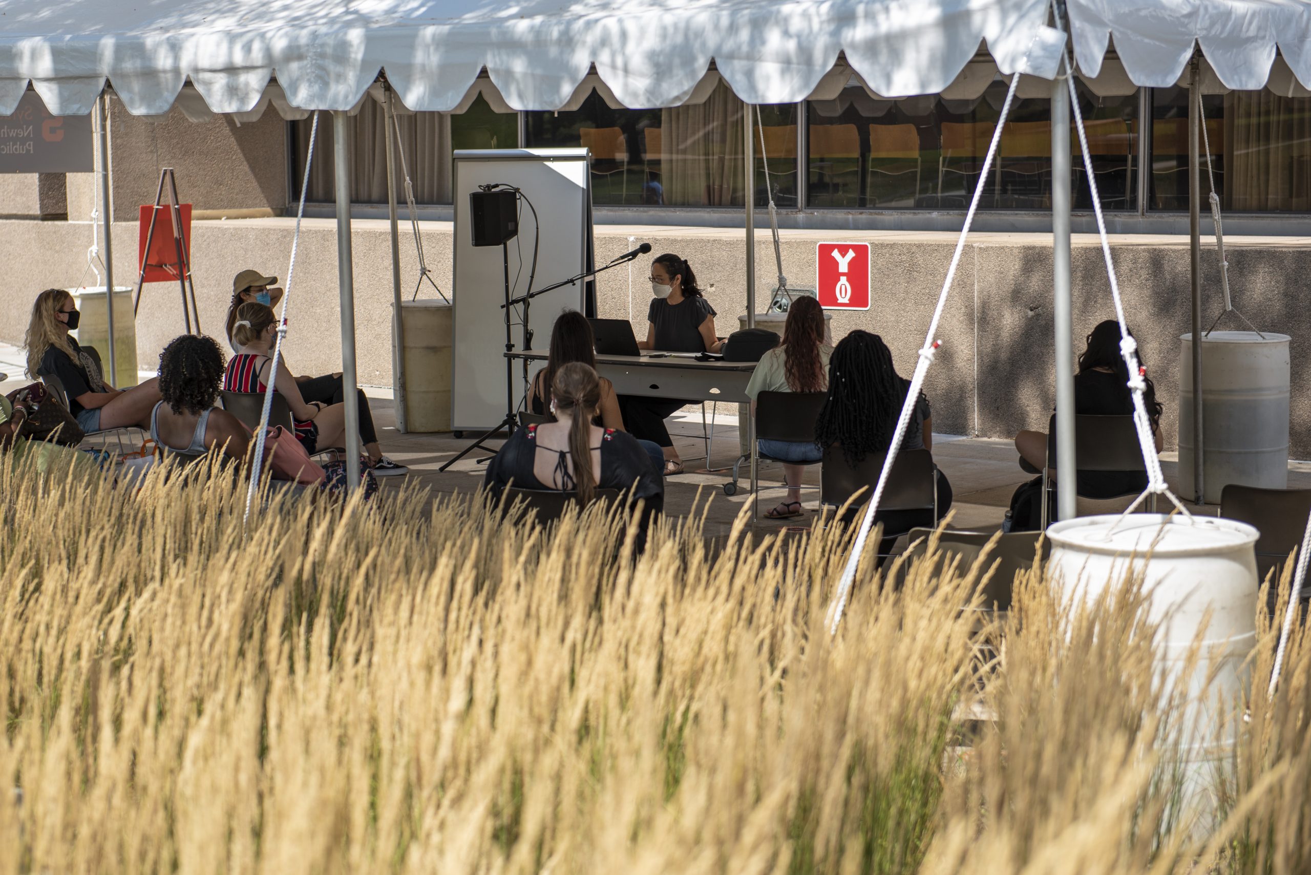 A Newhouse class meets under a tent on the first day of the 2020-2021 school year.