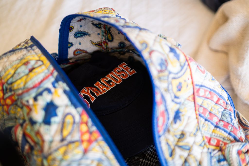 Emily's bag to return home.