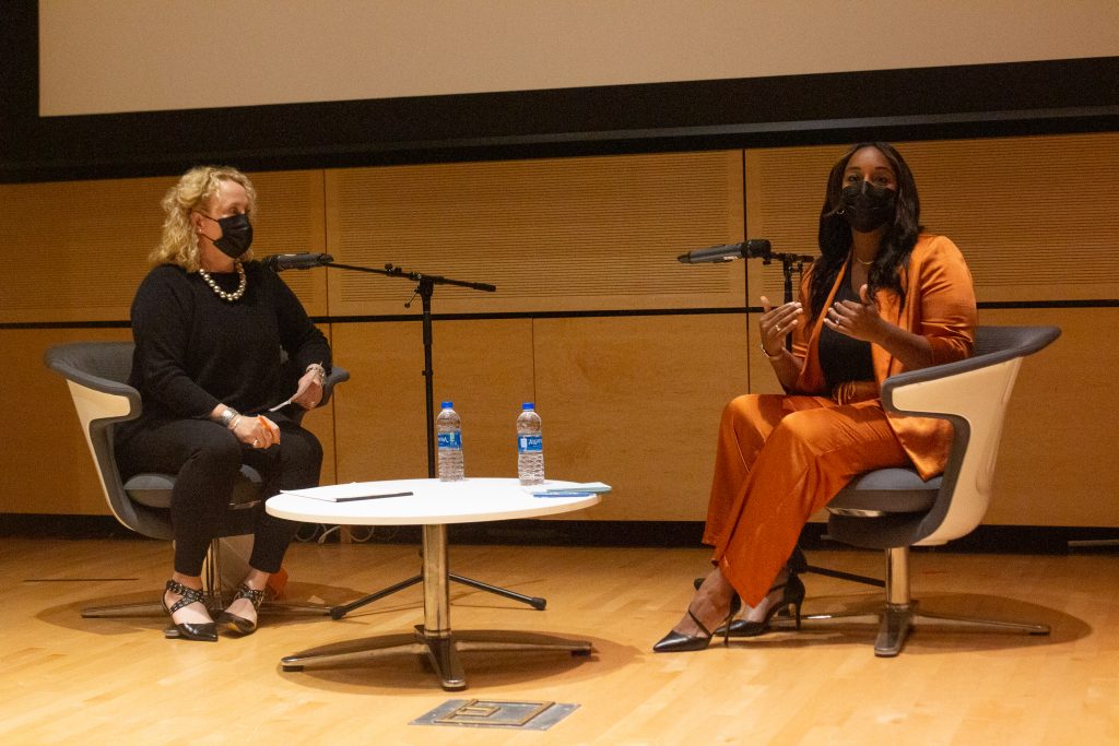 Natasha Alford, an award-winning journalist, digital host, and millenial media executive, speaks to Newhouse students in the Herg Auditorium on Wednesday, September 22, 2021. During her talk, Alford discussed topics such as balancing personal life and professional life, telling stories for people who cannot tell their own, and feeling accepted into traditionally white, male spaces as a Black woman.