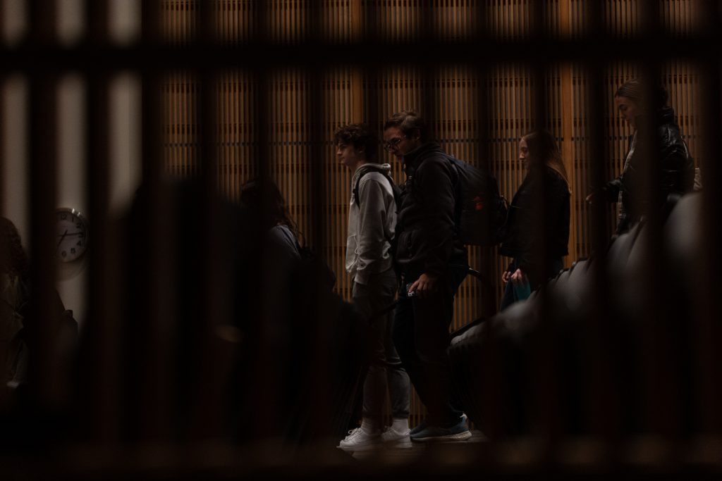 Students walk down the stairs at the end of the Gitner Symposium with Katy Tur on October 18th, 2022.