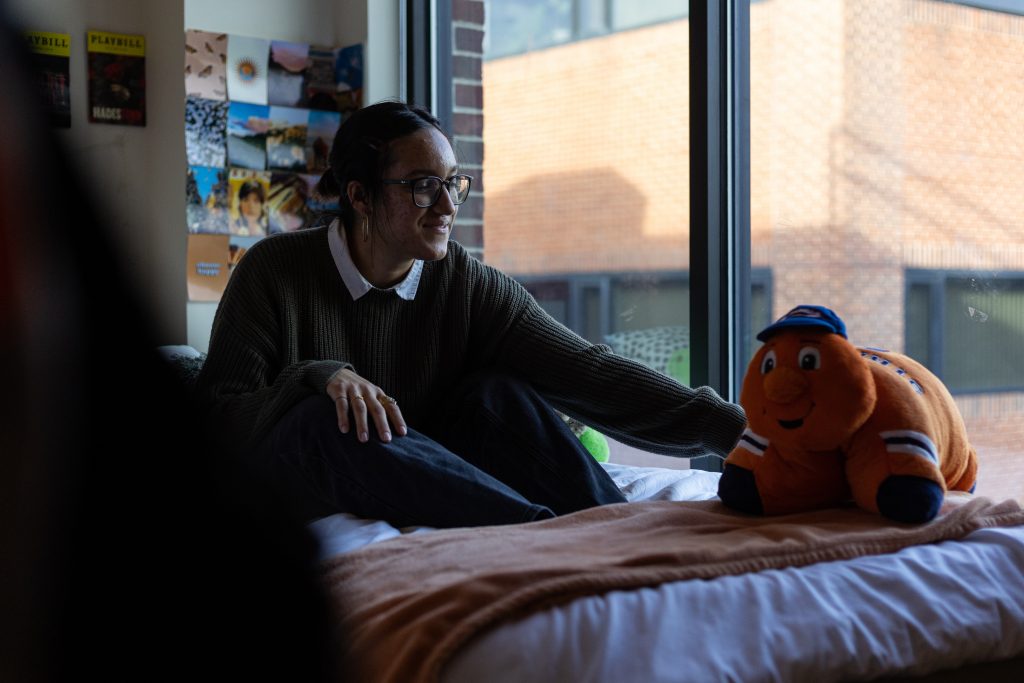 Sophia Moore sits on her bed on September 30th, 2022.