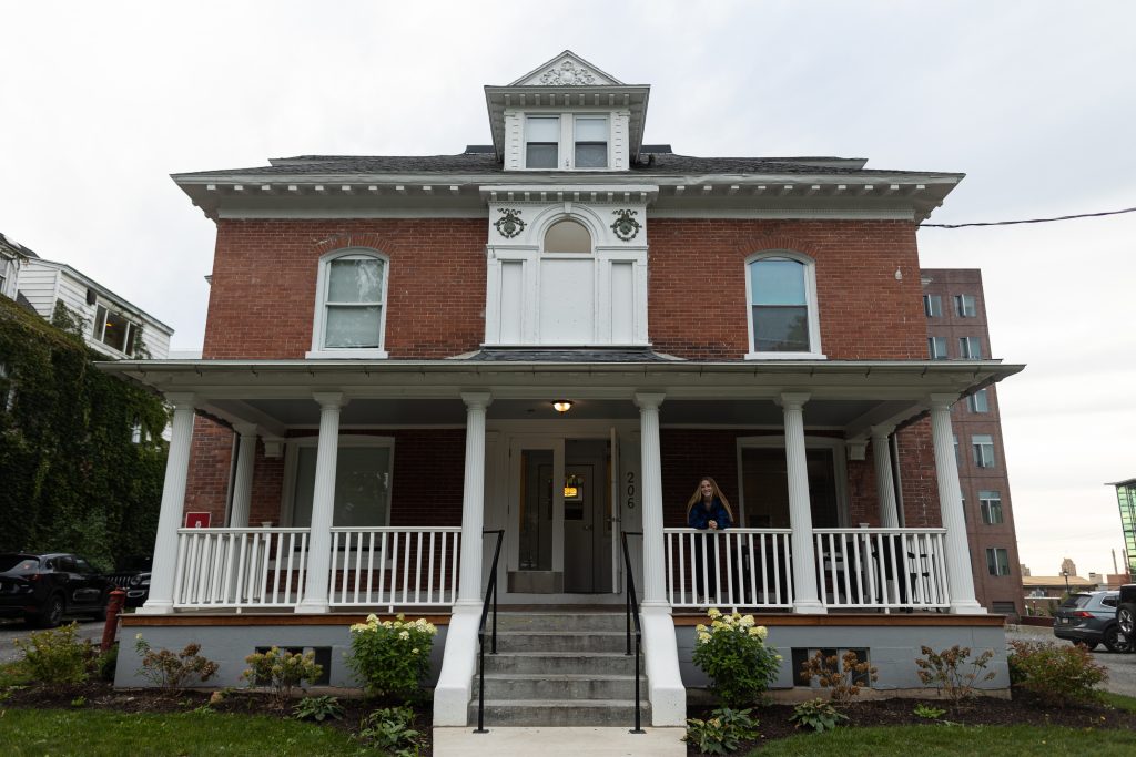 Toni Meehan stands on her porch in Syracuse on October 3rd 2022.