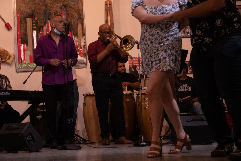 Visiters dance to the music at the 10th anniversary event of the La Casita Cultural Center, Sep 18, 2021