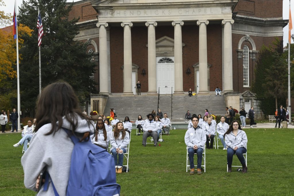 Syracuse University Remembrance Scholars sit for the