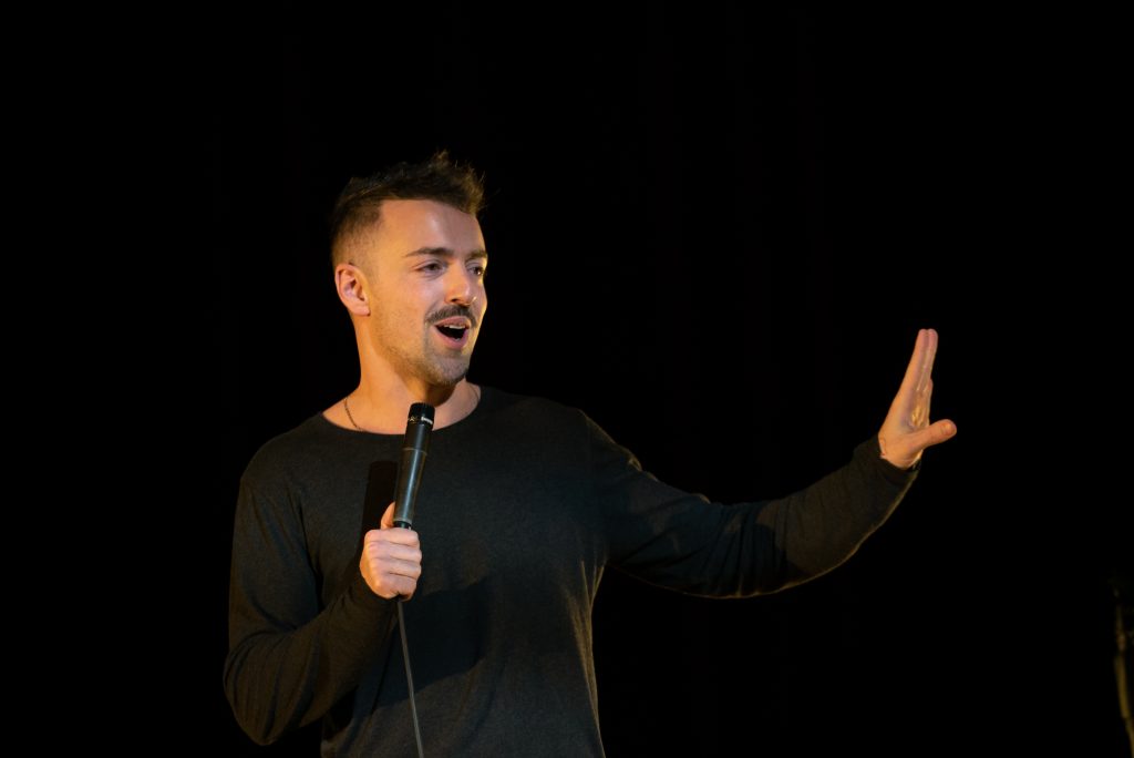 Comedian Matteo Lane, opener for Jay Pharoah, at the Feb. 18, 2022, University Union comedy show at Goldstein Auditorium.