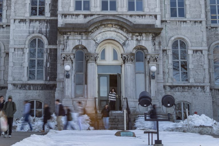 Students walk by Hall of Languages before class on Feb. 27, 2025.