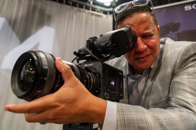 Newhouse School Prof. Milton Santiago tests a camera during Sony Signature Innovation Day in the Dick Clark Studios in Newhouse 3 on September 17, 2025.