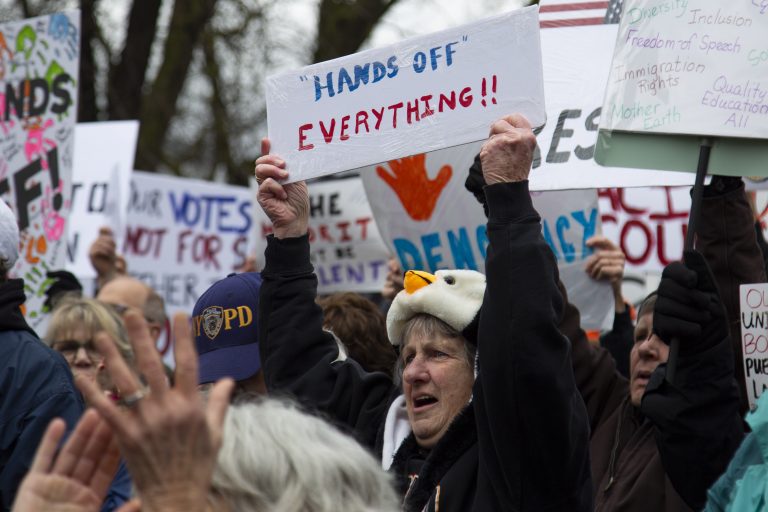 A woman dresses up as a penguin during the Hands Off protest in Syracuse, NY on April 5th, 2025.