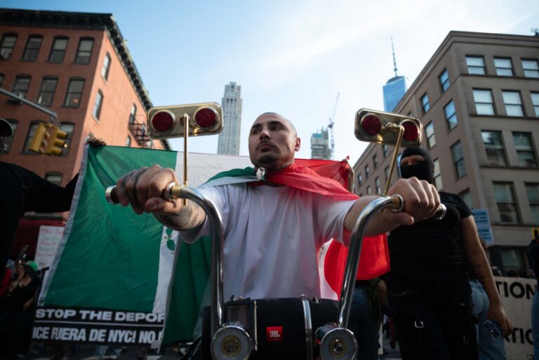 "AZ” heads the front of the Fuera de NYC protest which marched from Federal Plaza to Washington Square Park on the June 10, 2025.