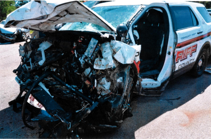 The damage to Washington County Sheriff’s Office Deputy Cori Winch’s vehicle after a collision with a car Susan Harrington, of Argyle, Washington County, was driving in 2019. Winch fell asleep at the wheel and crashed head on into Harrington's vehicle, according to an Attorney General's investigation of the incident. Harrington died in the accident. Credit: Provided, New York Attorney General’s Office