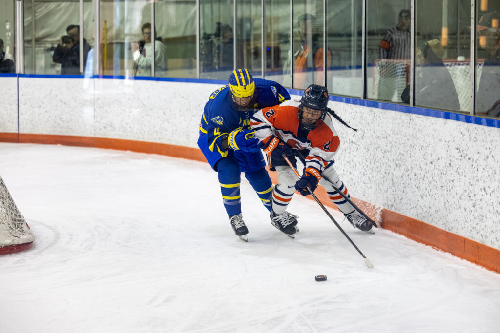 #2 Stella Cosrabile fights for the puck during the Syracuse Women's Ice Hockey game vs. Delaware on Oct. 30, 2026, at Tennity Ice Pavilion.
