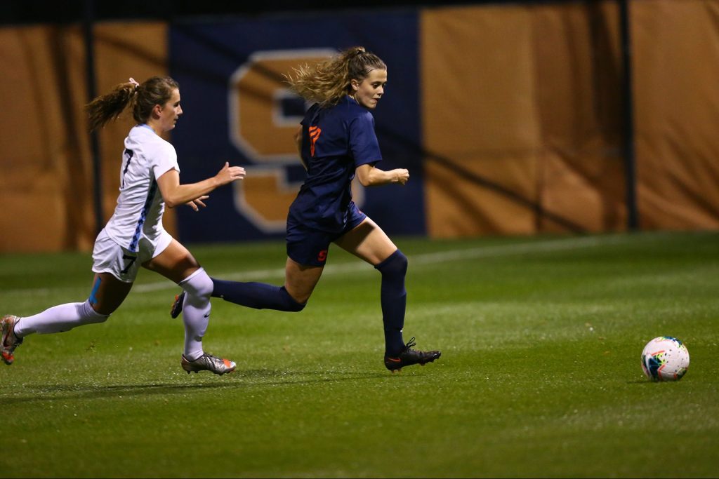 Hannah Pilley beats a UNC defender to the ball in Thursday night's home game against the Tar Heels.
