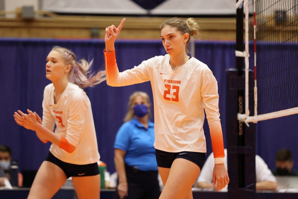 Syracuse's Viktoriia Lokhmanchuk (right) wags her finger after a University of Connecticut ball lands out of bounds in the third set of the volleyball match at the Women's Building on August 27, 2021.