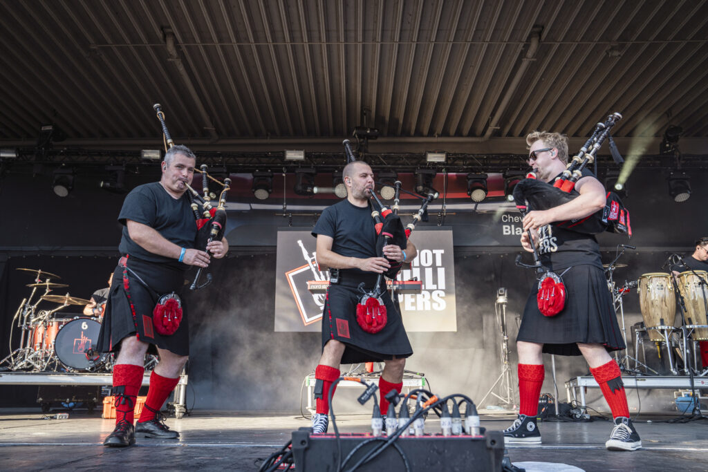 The Red Hot Chili Pipers brought their unique brand of “bagrock” to Chevy Court at the New York State Fair in Syracuse, N.Y., on Wednesday, Aug. 27, 2025. Formed in Scotland in 2002, the band has gained international attention for blending traditional Great Highland bagpipes with rock and pop classics, covering artists from AC/DC to Coldplay.