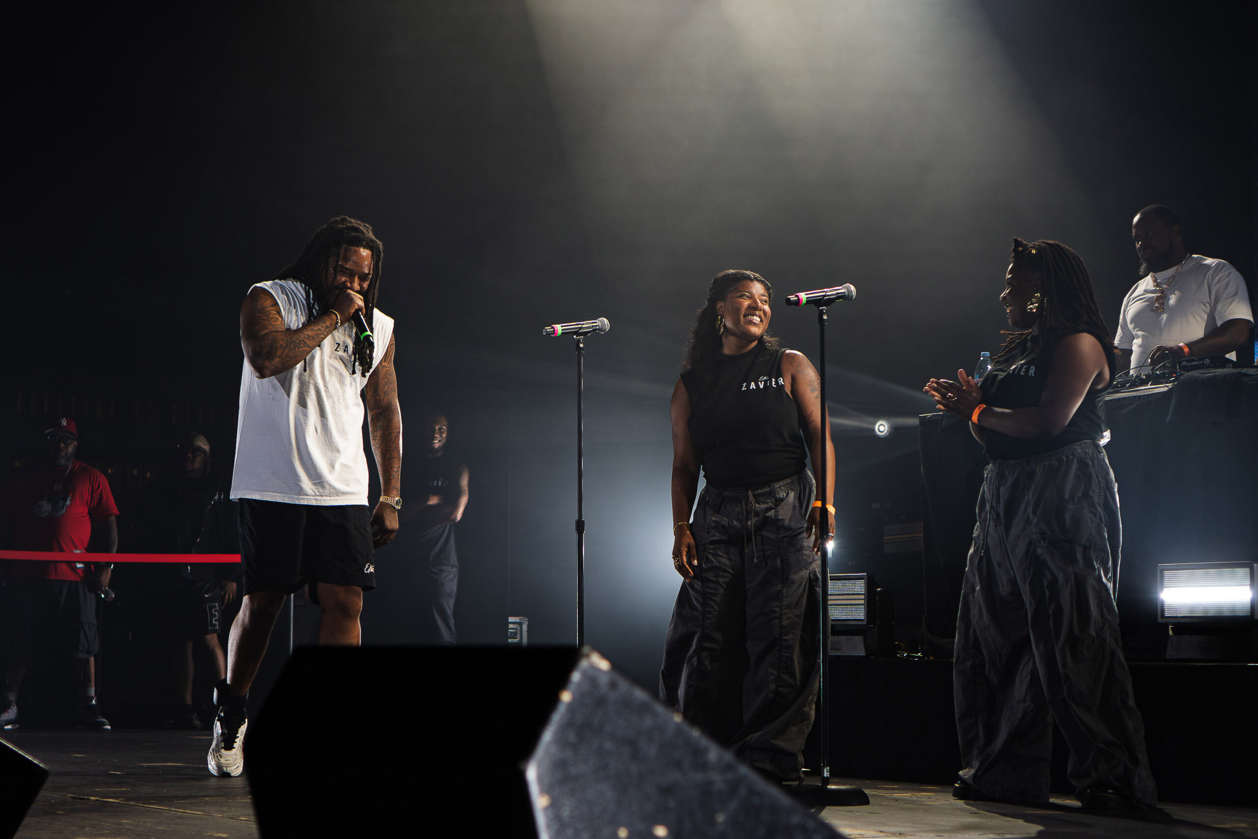 Fetty Wap invites his two sisters, Divinity & Ymanie, on stage as background vocals to help him sing and pass out white roses to his song 
