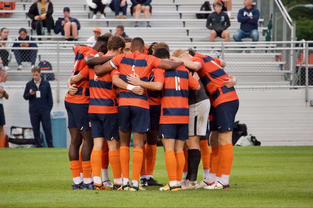 SU Men's soccer team huddles during the Niagara game