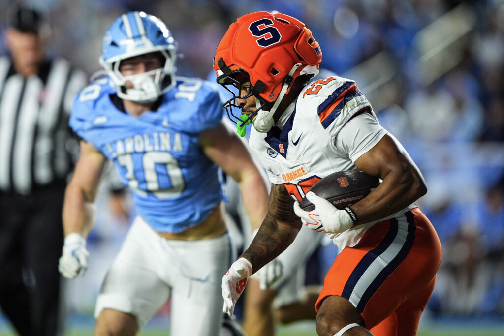 Running back Ahmad Miller #22 of the Syracuse Orange rushes for a first down during the first half of his game against the North Carolina Tar Heels at Kenan Stadium on October 24, 2026 in Chapel Hill, North Carolina.