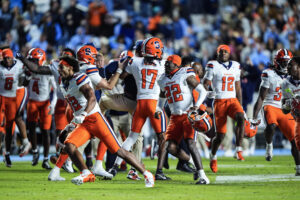 The Syracuse Orange reacts after winning their game in overtime against the North Carolina Tar Heels at Kenan Stadium on October 24, 2026 in Chapel Hill, North Carolina.