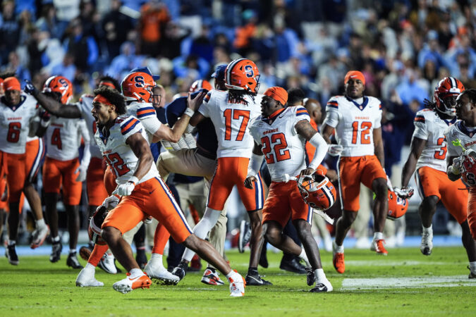 The Syracuse Orange reacts after winning their game in overtime against the North Carolina Tar Heels at Kenan Stadium on October 24, 2026 in Chapel Hill, North Carolina.