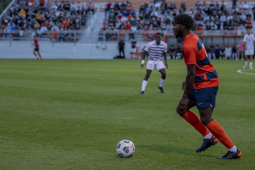 Freshman defender Olu Oyegunie controls a ball during a Syracuse men's soccer match against Niagra at the SU Soccer Stadium, September 6.