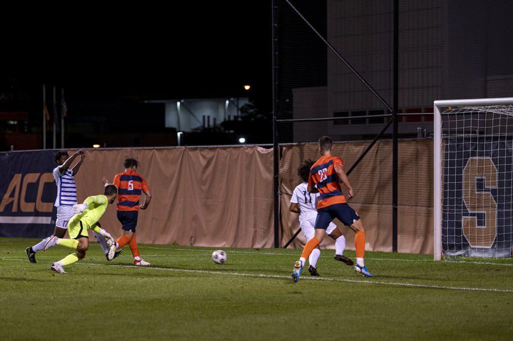 Freshman midfielder Curt Calov scores a goal during a Syracuse men's soccer match against Niagara at the SU Soccer Stadium, September 6.