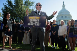 U.S. Senate Committee on Commerce, Science & Transportation Chairman Ted Cruz (R-TX) (C), ranking member Sen. Maria Cantwell (D-WA) (L) and Sen. Shelley Moore Capito (R-WV) hold a news conference with NCAA athletes and coaches about the Protect College Sports Act on September 14, 2026 in Washington, DC. The bill will set rules for college athlete "Name Image and Likeness," revenue share cap, transfers, tampering, eligibility, and enforcement of sanctions.