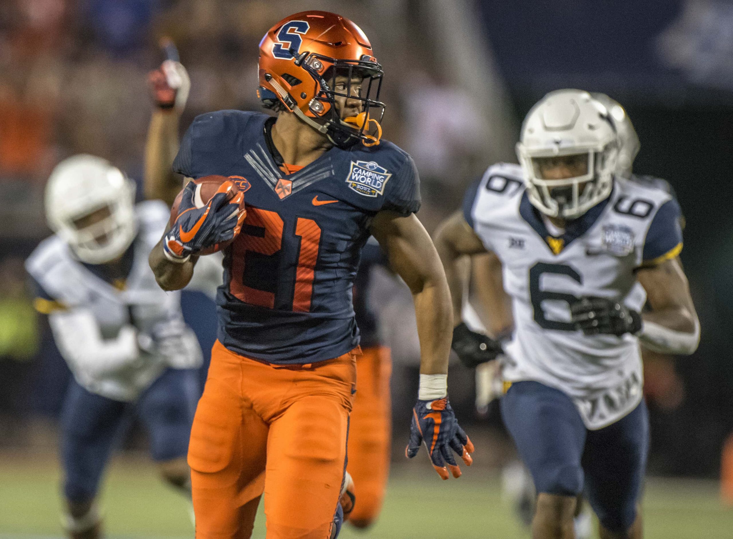 The Syracuse Orange defeat the West Virginia Mountaineers 34-18.