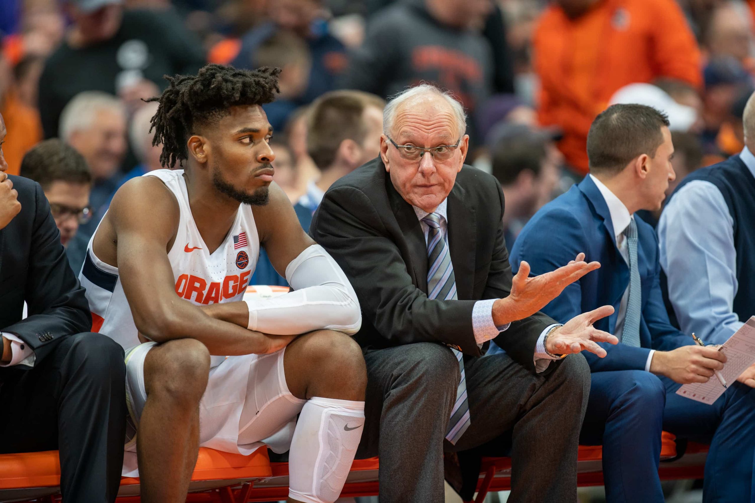 Coach Jim Boeheim talks to Quincy Guerrier on the bench during SU's loss to Virginia on Nov. 6, 2019.