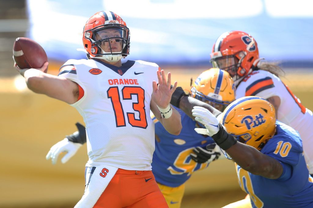 Sep 19, 2020; Pittsburgh, Pennsylvania, USA; Syracuse Orange quarterback Tommy DeVito (13) passes the ball against the Pittsburgh Panthers during the third quarter at Heinz Field.