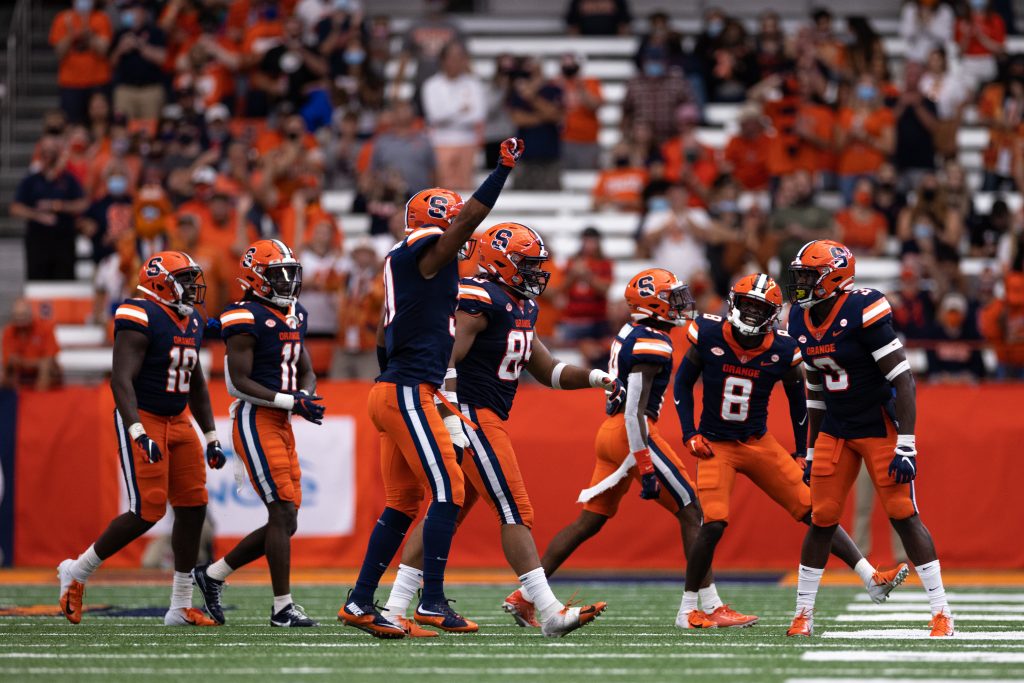 Members of the Syracuse defense celebrate with the crowd.