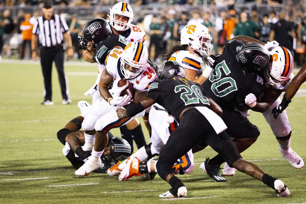 Syracuse's Sean Tucker (#34) runs the ball during the Ohio versus Syracuse game on Saturday, Sep. 4, 2021, in Athens, Ohio. Syracuse won the match 29-9.
