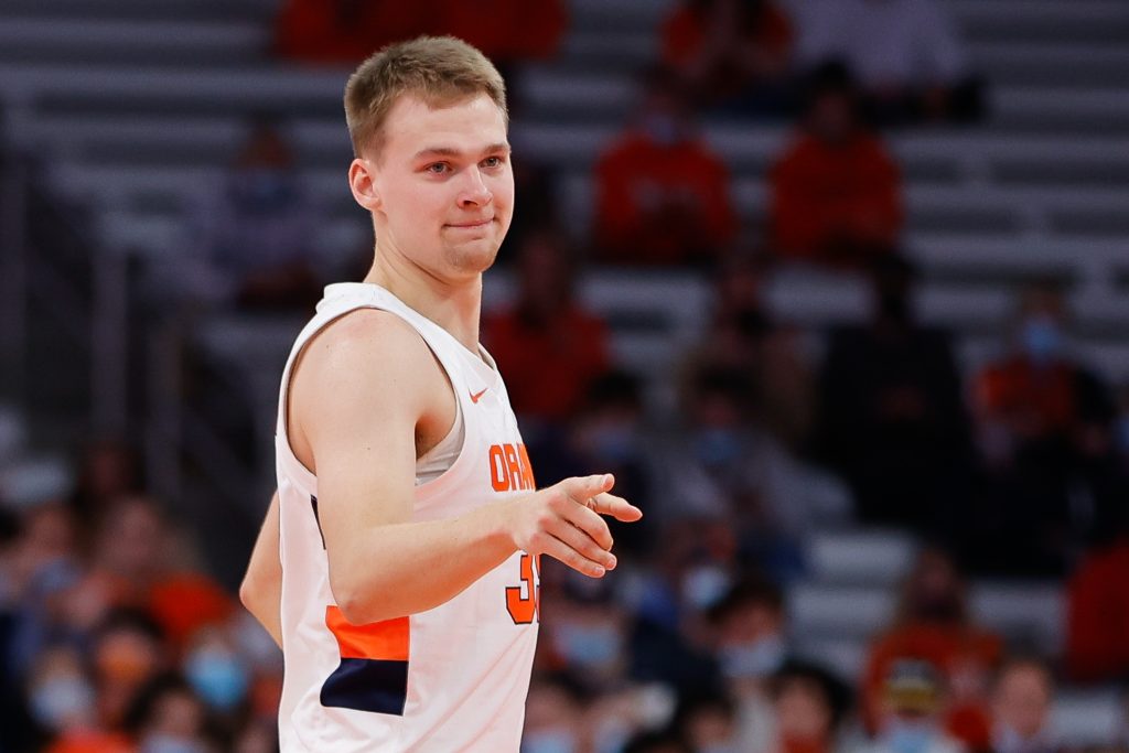 Syracuse's Buddy Boehim points towards the hoop after making a 3-pointer during a Men's Basketball exhibition game against Pace University on October 27, 2021.