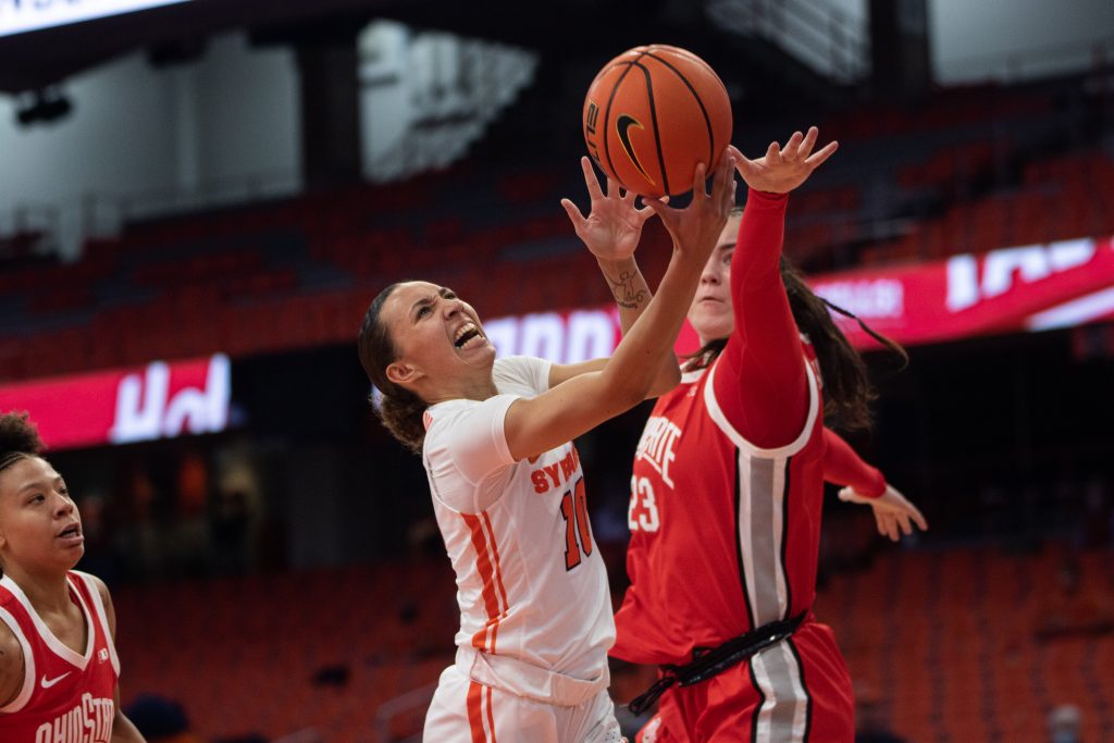 Najé Murray drives on OSU's Rebeka Mikulášiková for two of her 21 points.