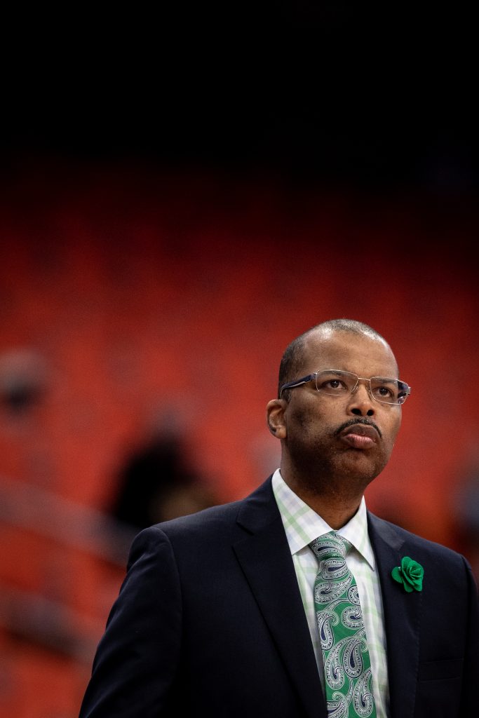 Syracuse acting head coach, Vonn Reed, looks up at the scoreboard near the end of his team's win on Saturday.